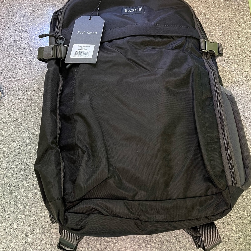 Nice black backpack with laptop or tablet padded pocket. Raxus